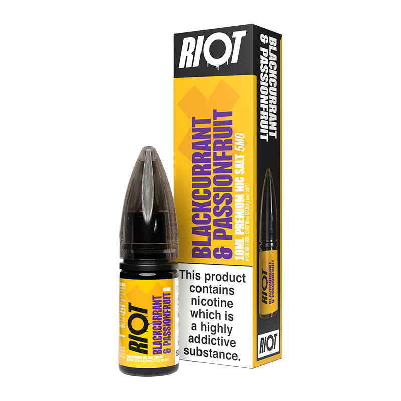 A 10ml bottle of Riot X Blackcurrant & Passionfruit 5mg  e-liquid next to its retail packaging box, both featuring a yellow and black design with a prominent nicotine warning label.