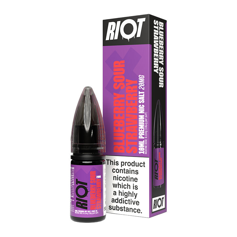 A 10ml bottle of Riot X Blueberry Sour Strawberry 20mg  e-liquid next to its retail packaging box, both featuring a purple and black design with a prominent nicotine warning label.