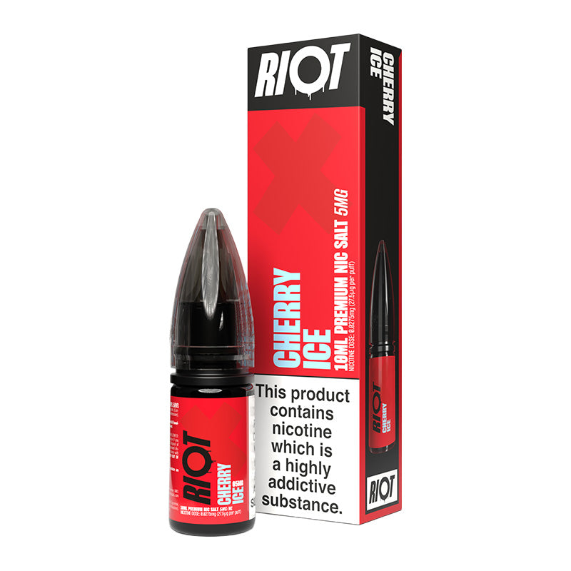 A 10ml bottle of Riot X Cherry Ice 5mg  e-liquid next to its retail packaging box, both featuring a red and black design with a prominent nicotine warning label.
