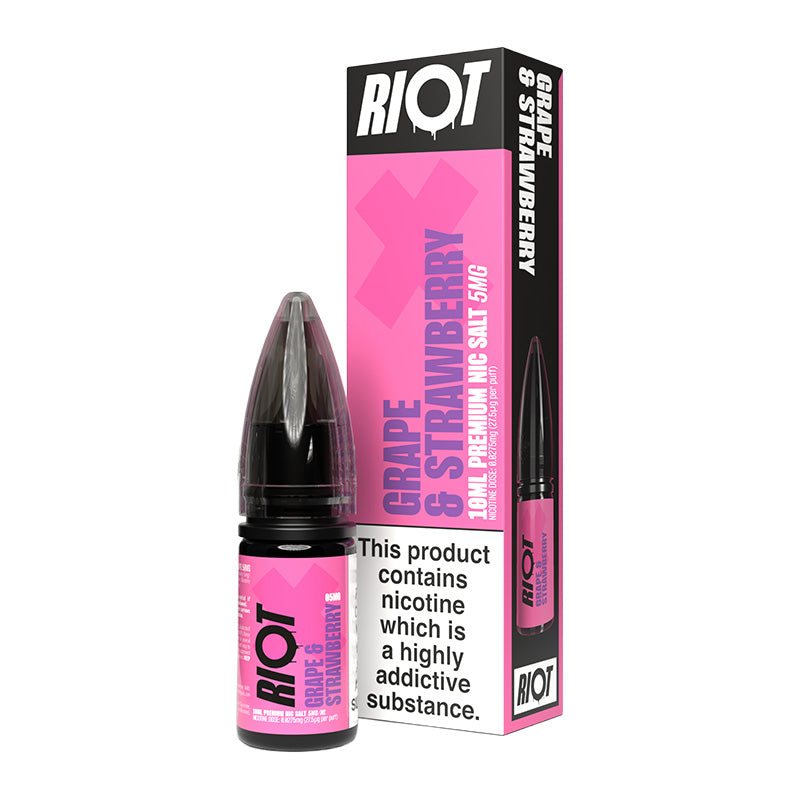 A 10ml bottle of Riot X Grape & Strawberry 5mg  e-liquid next to its retail packaging box, both featuring a pink and black design with a prominent nicotine warning label.