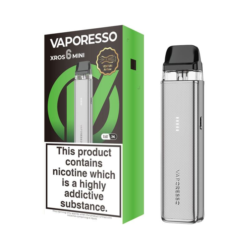 Vaporesso XROS 6 Mini vaping device silver and packaging on a white background